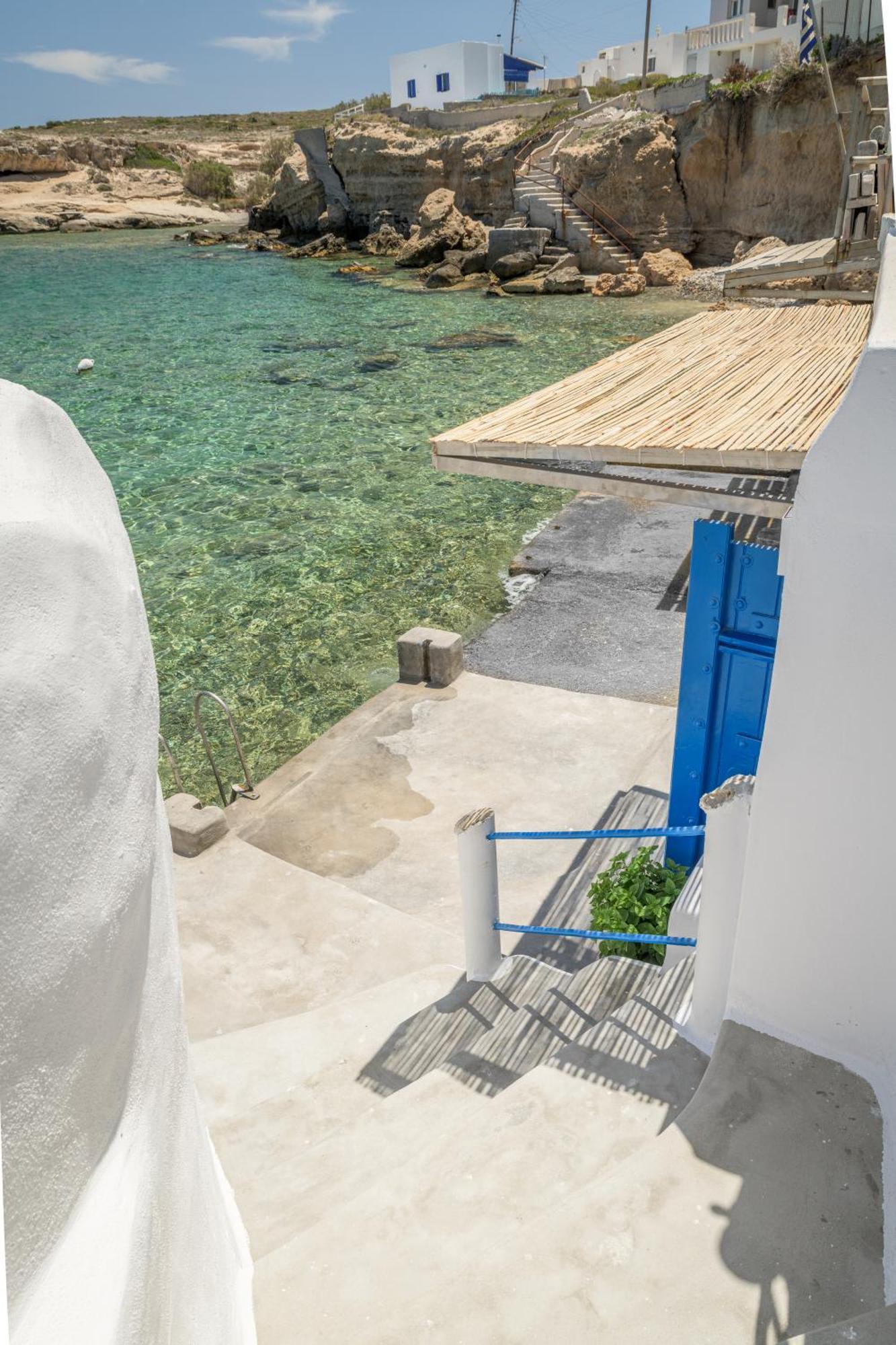 Esperanza Boathouses Mandrakia Bagian luar foto